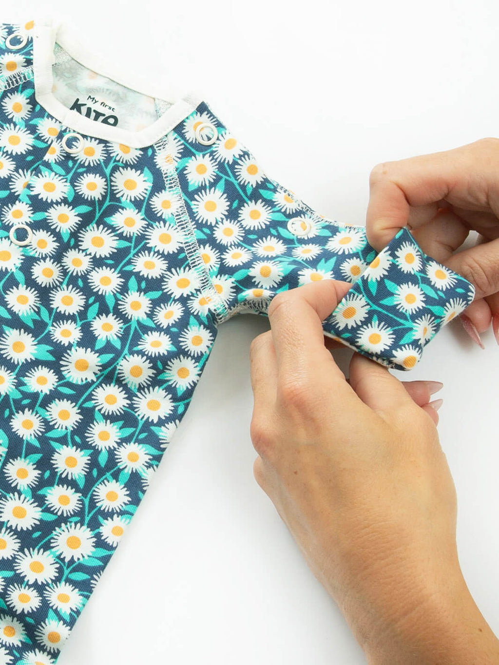 Close-up sleeve cuff detail on preemie organic cotton sleepsuit Daisy Fields