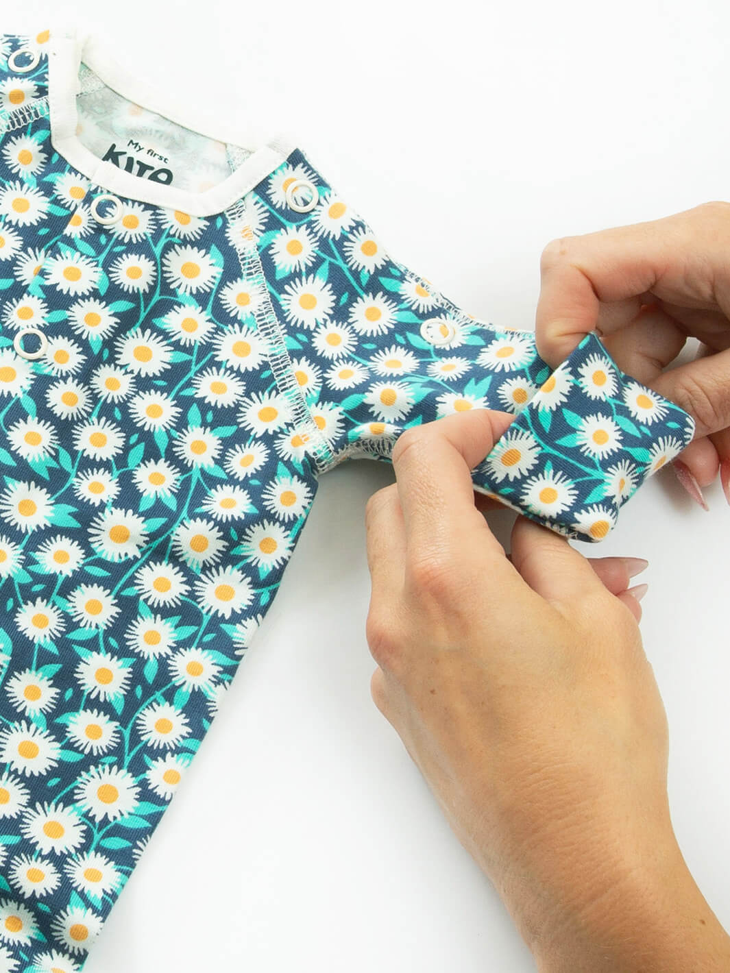 Close-up sleeve cuff detail on preemie organic cotton sleepsuit Daisy Fields