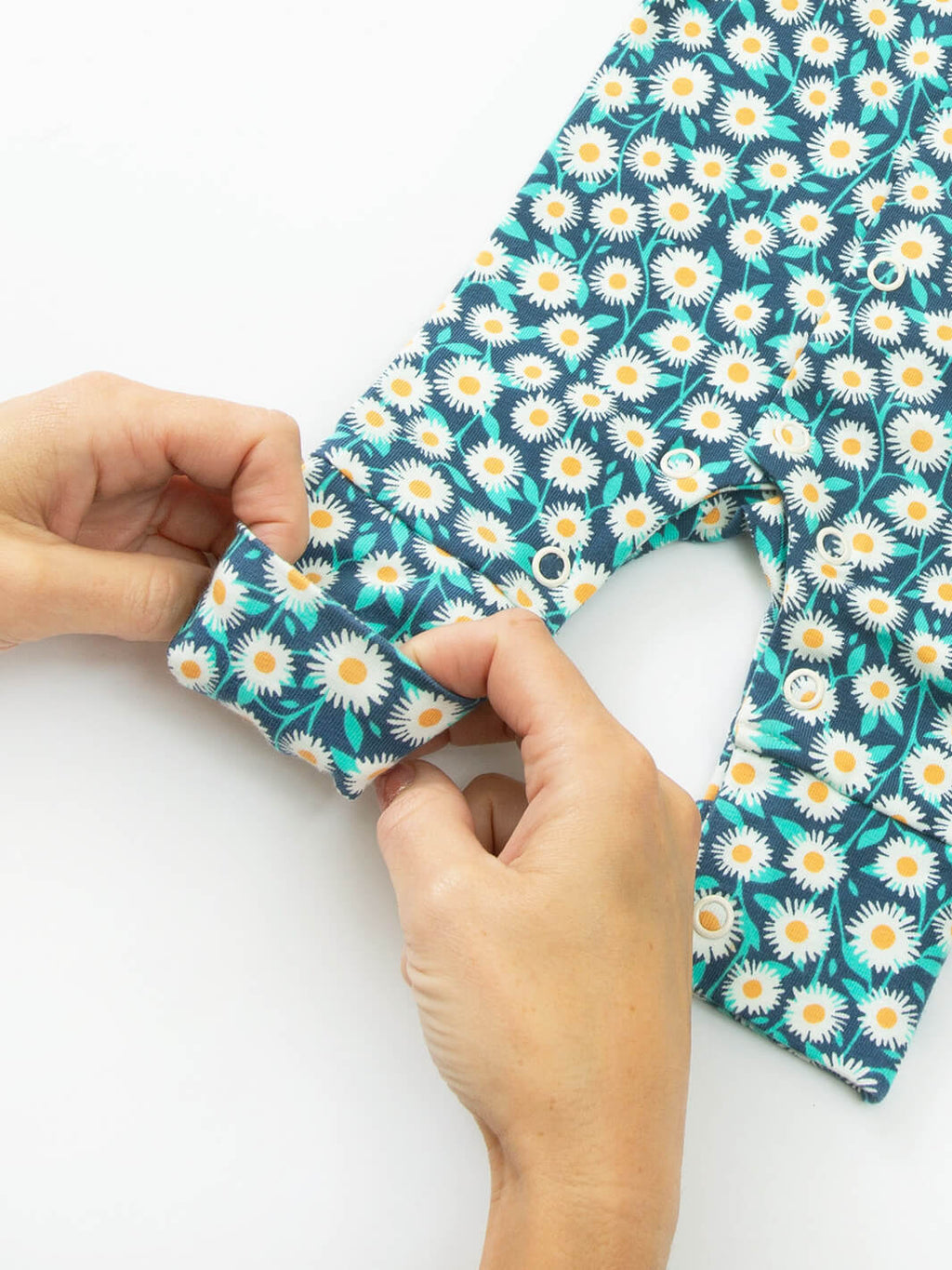 Close-up ankle cuff detail on preemie organic cotton sleepsuit Daisy Fields