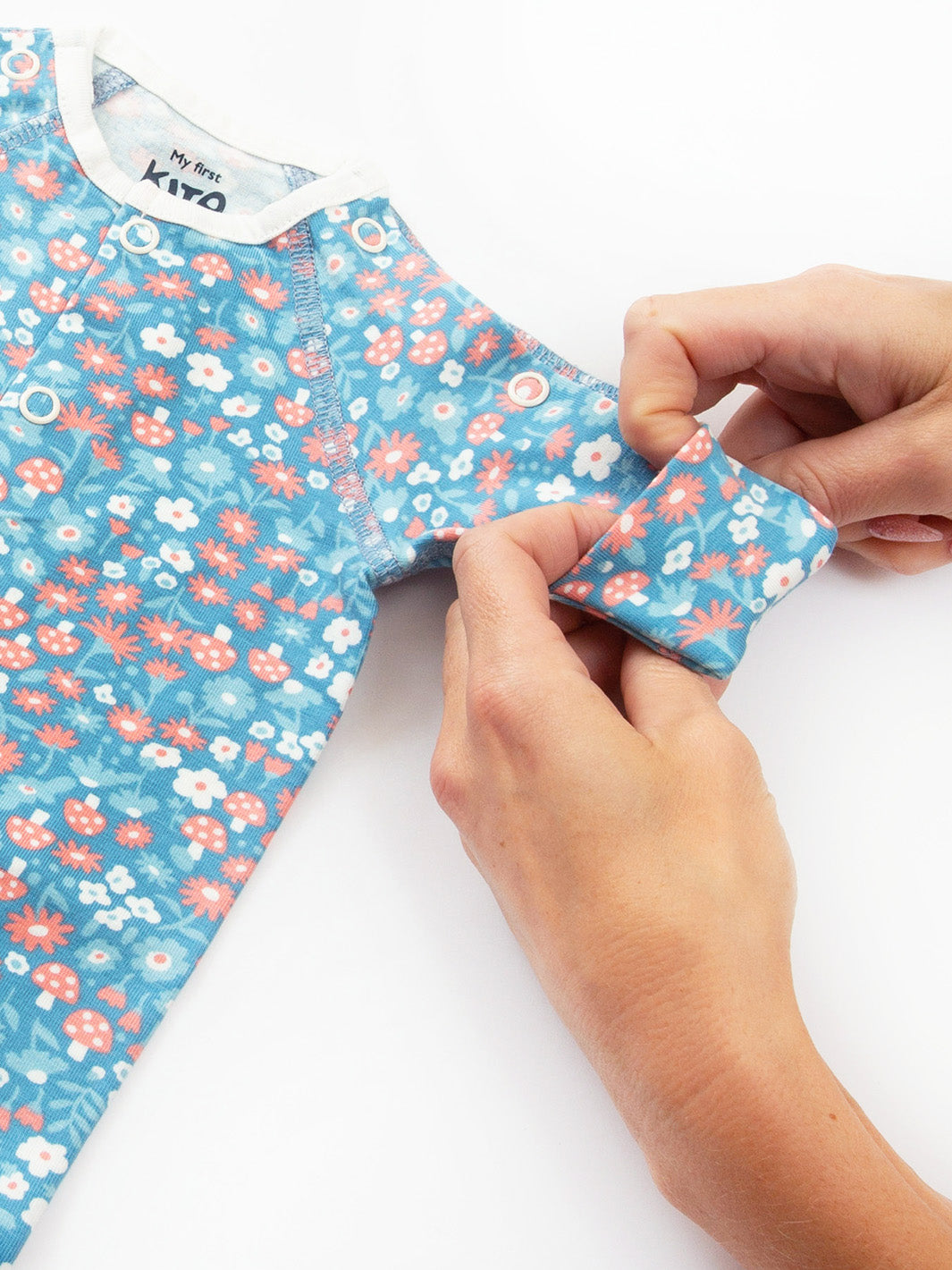 Close-up sleeve cuff detail on preemie organic cotton sleepsuit Winter Woodland