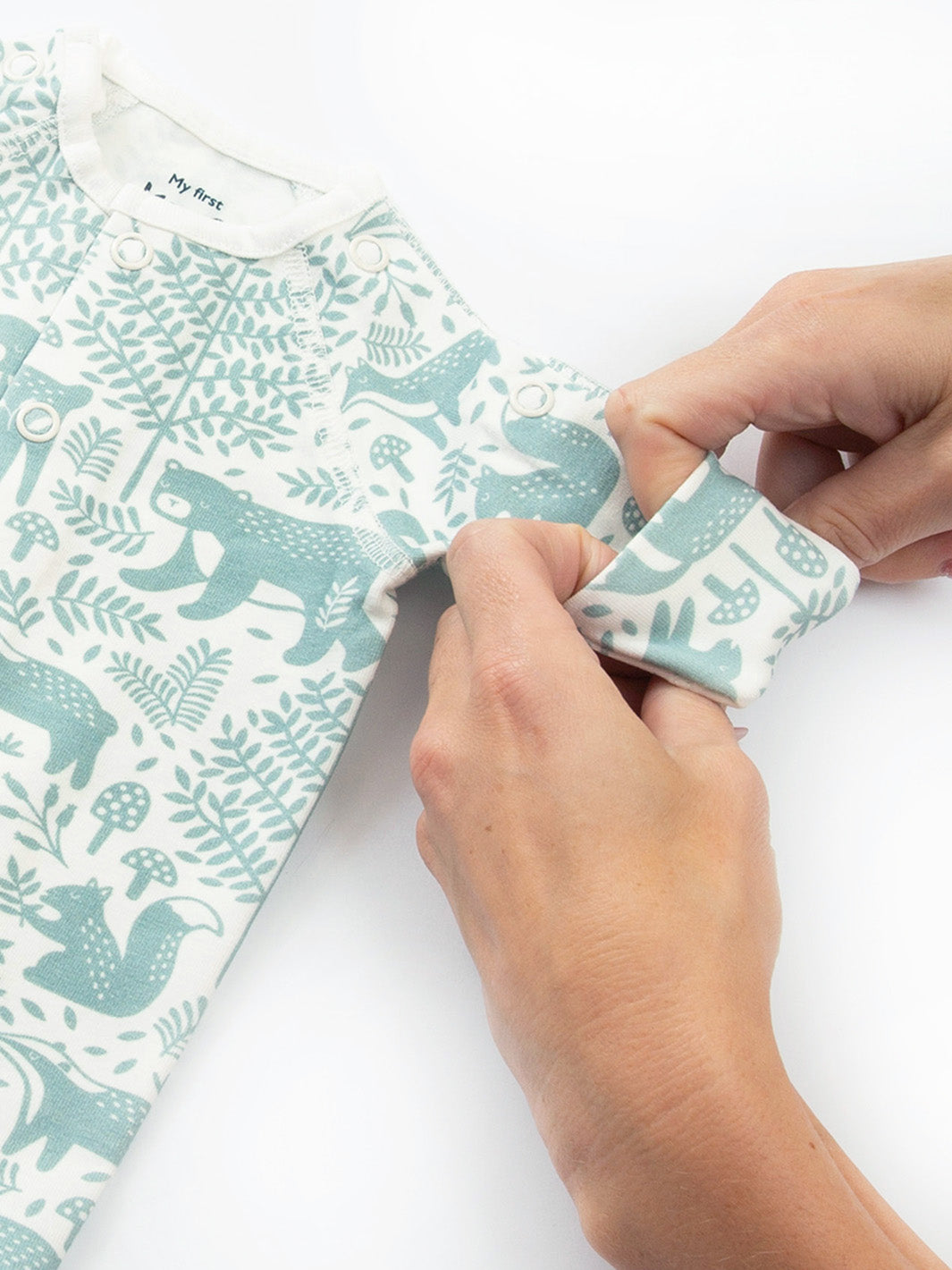 Close-up sleeve cuff detail on preemie organic cotton sleepsuit Woodland Walk