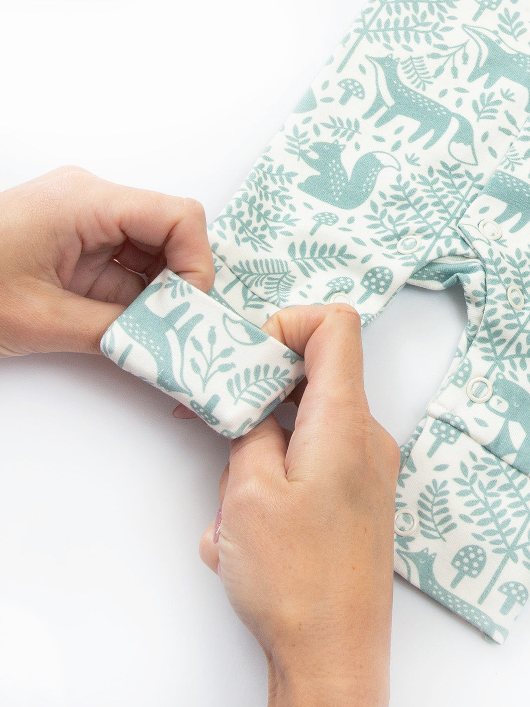 Close-up ankle cuff detail on preemie organic cotton sleepsuit Woodland Walk